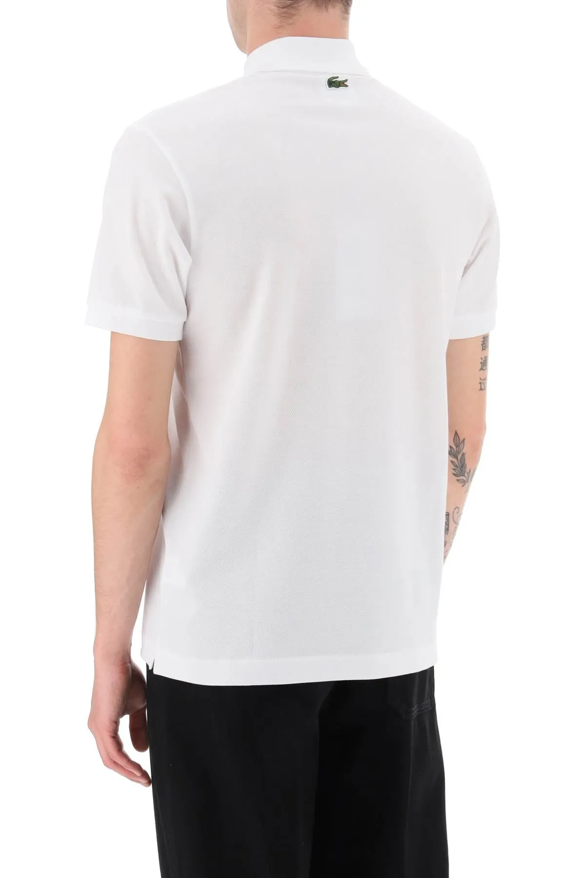 Lacoste netflix the witcher polo shirt in organic cotton classic fit