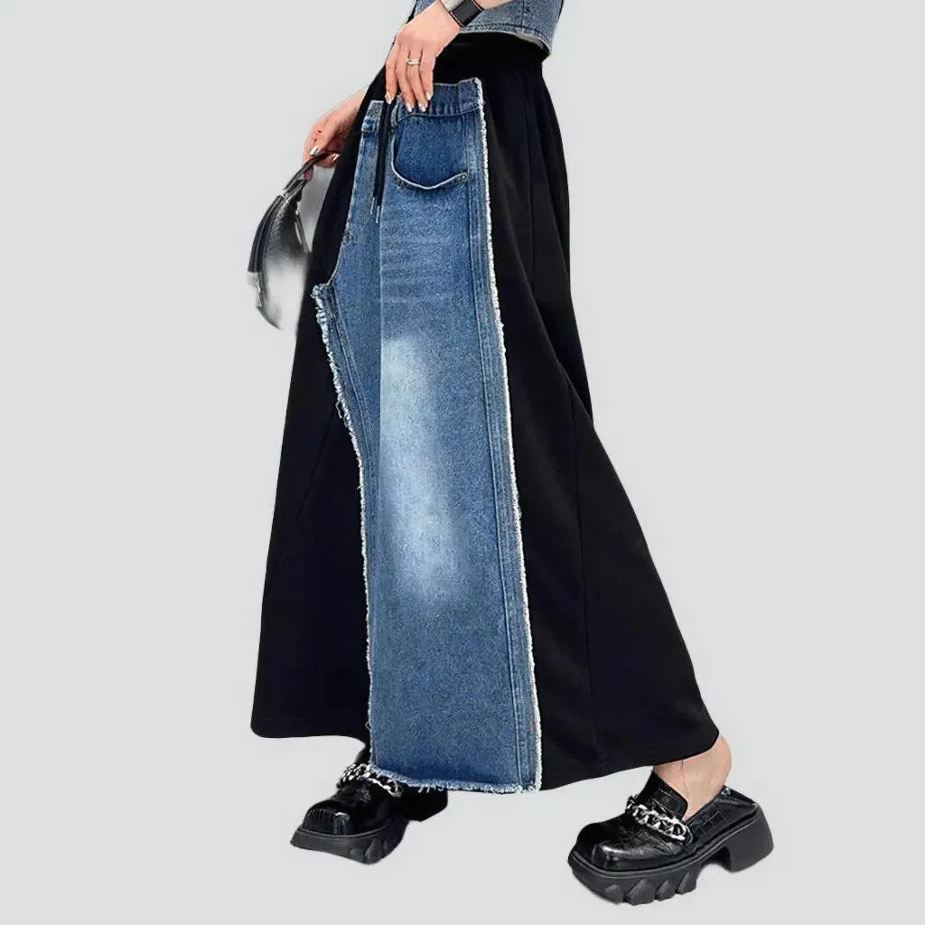 Raw hem whiskered denim skirt